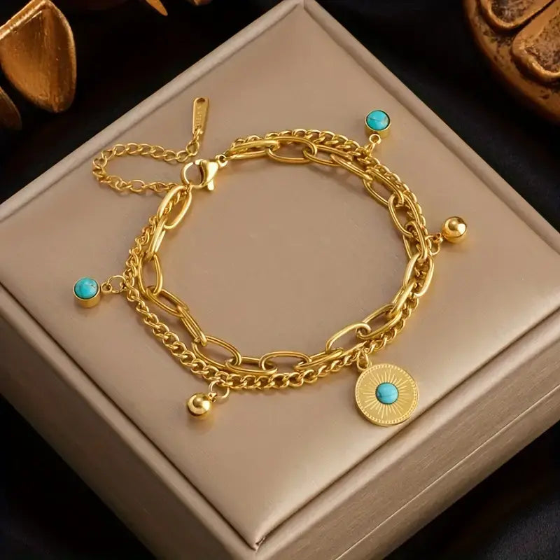 gold stainless steel bracelet,
women’s gold bracelet,
turquoise bead bracelet,
sunburst charm bracelet,
double layer bracelet,
316L stainless steel jewellery,
women’s layered bracelet,
boho chic bracelet,
turquoise jewellery for women,
gold bracelet gift for her,
elegant women’s bracelet,
everyday gold bracelet,
women’s beach jewelry,
minimalist gold bracelet,
durable stainless steel bracelet,
fashion bracelet for women,
turquoise charm bracelet,
gold layered chain bracelet,
sun charm bracelet
