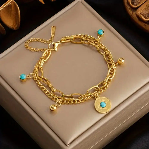 gold stainless steel bracelet,
women’s gold bracelet,
turquoise bead bracelet,
sunburst charm bracelet,
double layer bracelet,
316L stainless steel jewellery,
women’s layered bracelet,
boho chic bracelet,
turquoise jewellery for women,
gold bracelet gift for her,
elegant women’s bracelet,
everyday gold bracelet,
women’s beach jewelry,
minimalist gold bracelet,
durable stainless steel bracelet,
fashion bracelet for women,
turquoise charm bracelet,
gold layered chain bracelet,
sun charm bracelet