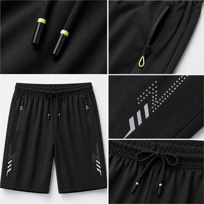 FlexDry men’s black shorts with zipped pockets, drawcord waist and reflective details