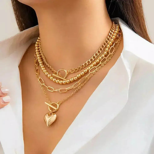layered gold necklace set, heart pendant necklace UK, women’s layered jewellery, gold choker necklace set, trendy 2024 necklaces, multi-layer necklace for women, Y2K gold accessories, elegant gold chain set, 4-in-1 necklace gift for her, fashionable layered necklace UK