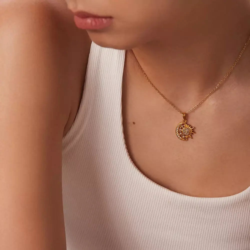 golden eclipse necklace,
gold stainless steel necklace,
waterproof gold necklace,
minimalist gold necklace,
elegant gold jewelry for women,
luxury gold pendant necklace,
long lasting gold jewelry,
Amorate necklace,
gold moon pendant necklace,
everyday waterproof jewelry