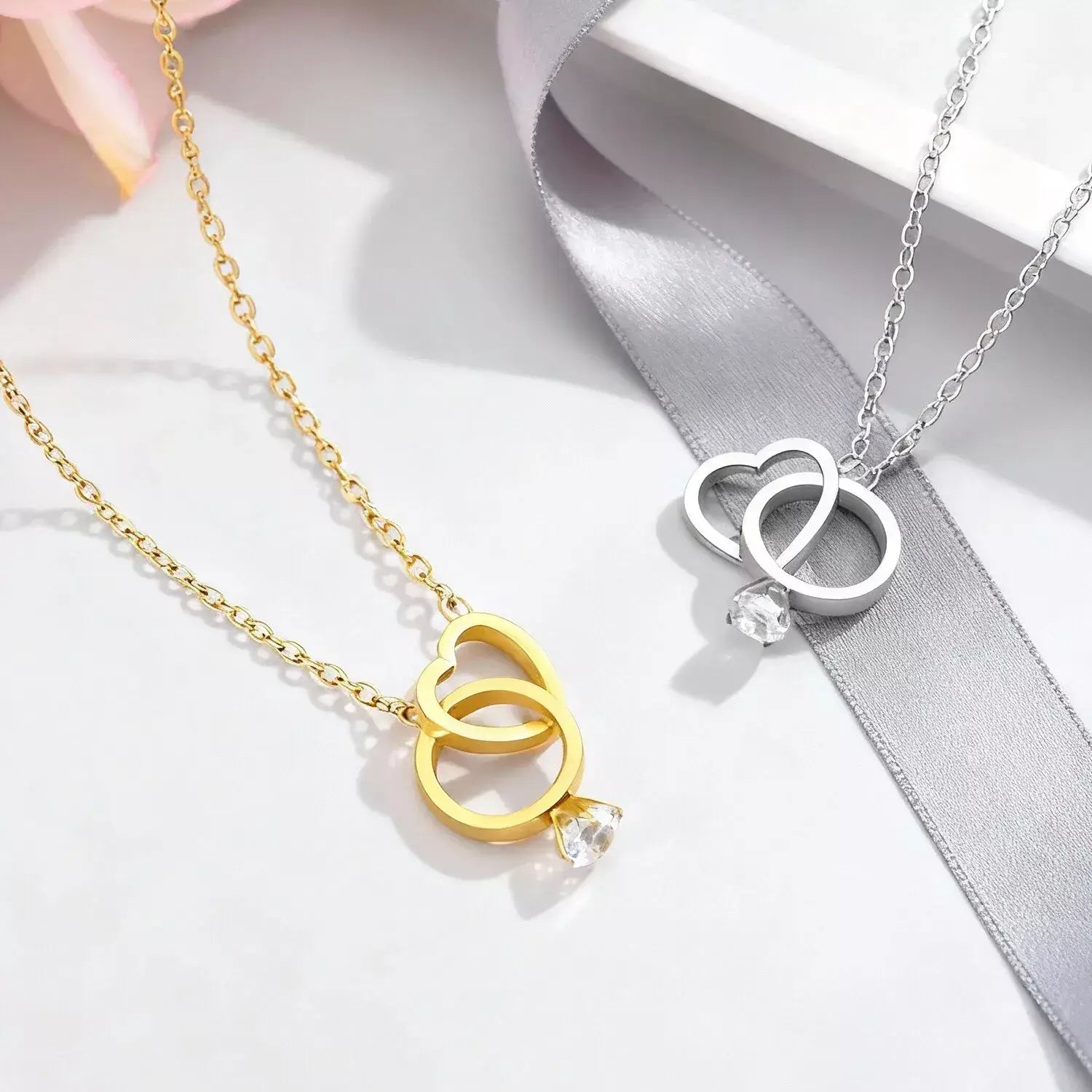 eternal knot necklace, romantic necklace, valentine’s day necklace, valentine’s day gift, romantic gift for her, love necklace, heart and ring necklace, forever love necklace, stainless steel necklace, couples necklace, promise necklace, symbolic jewelry, meaningful necklace, anniversary gift, gift for girlfriend, gift for wife, unisex necklace