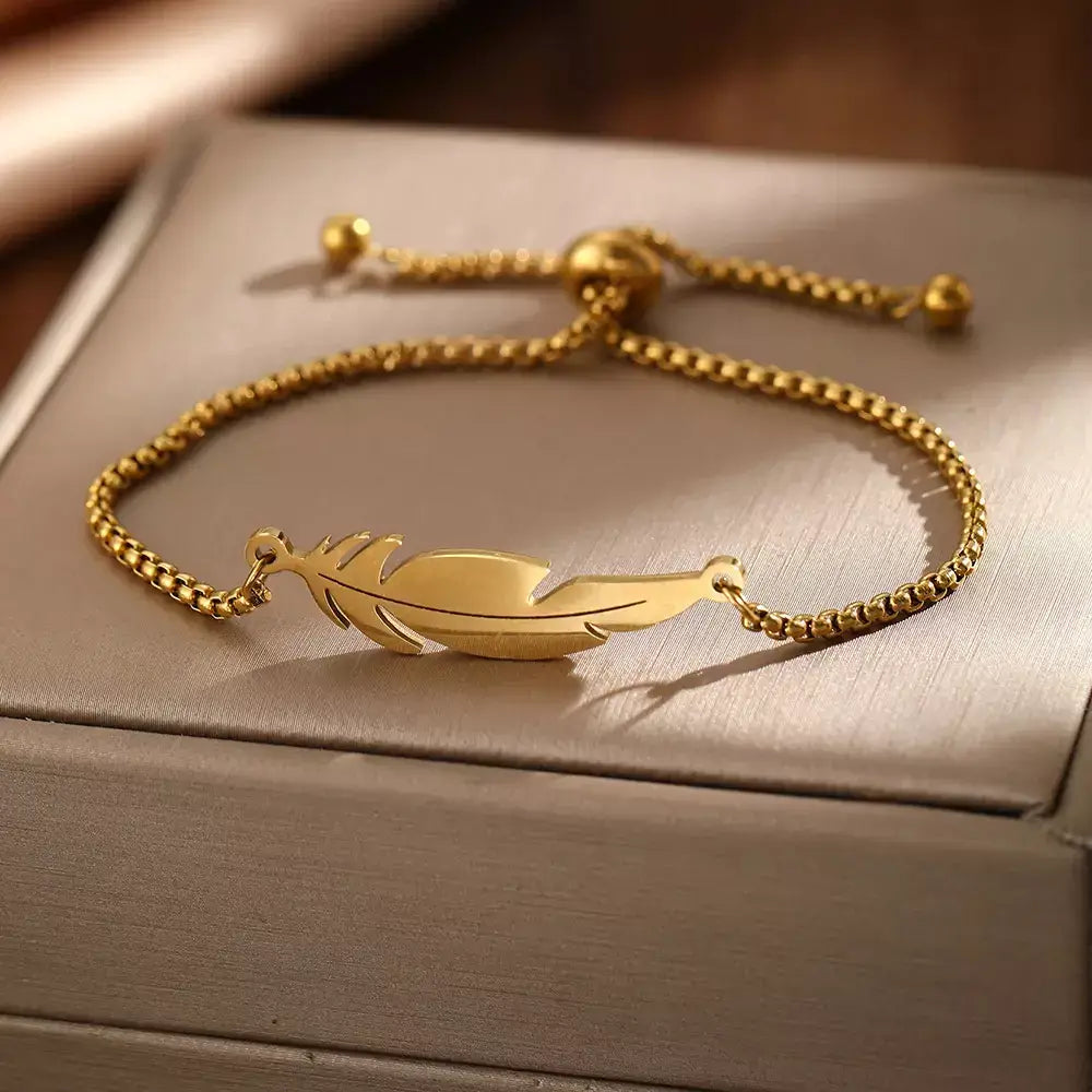 feather bracelete,

women’s bracelet,

stainless steel bracelete,

feather charm bracelete,

gold feather bracelet,

silver feather bracelete,

adjustable women’s bracelet,

minimalist bracelet for women