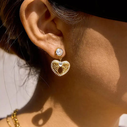 wings of love earrings, heart wings earrings, gold heart earrings, wing heart earrings for women, 18k gold plated heart earrings, zircon heart earrings, stainless steel gold earrings, minimalist gold earrings, delicate gold earrings, hypoallergenic gold earrings, romantic earrings gift, jewellery gift for her, valentines day earrings