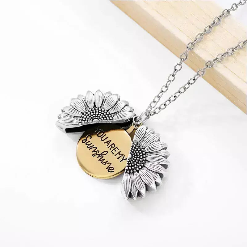 You Are My Sunshine – Sunflower Pendant Necklace,sunflower necklace, sunflower pendant, daisy chain necklace, floral pendant jewellery, friendship necklace, gift for best friend, meaningful necklace, engraved locket necklace, gift for her, sentimental gift for girlfriend, birthday gift for best friend, jewellery for loved ones, personalised necklace UK, heart necklace for her, boho necklace, bohemian jewellery, delicate pendant necklace, stainless steel necklace, everyday jewellery UK