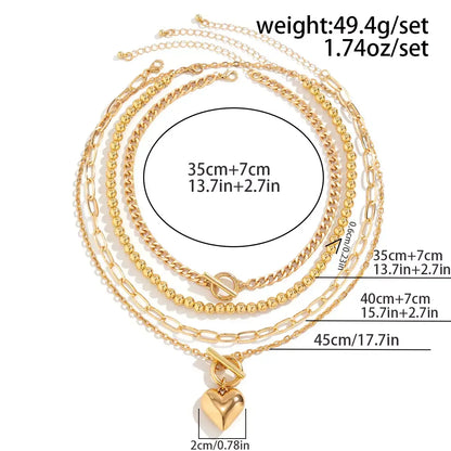 layered gold necklace set, heart pendant necklace UK, women’s layered jewellery, gold choker necklace set, trendy 2024 necklaces, multi-layer necklace for women, Y2K gold accessories, elegant gold chain set, 4-in-1 necklace gift for her, fashionable layered necklace UK