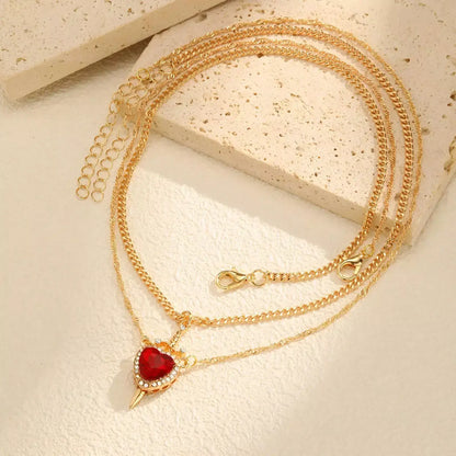 Snow White couple necklace, Huntsman heart and sword necklace, Matching couple necklaces, Romantic Valentine's Day jewellery, Heart and sword pendant, Couple pendant necklace set, Love necklace for couples, Fairytale couple jewellery, His and hers matching necklaces, Snow White inspired necklace