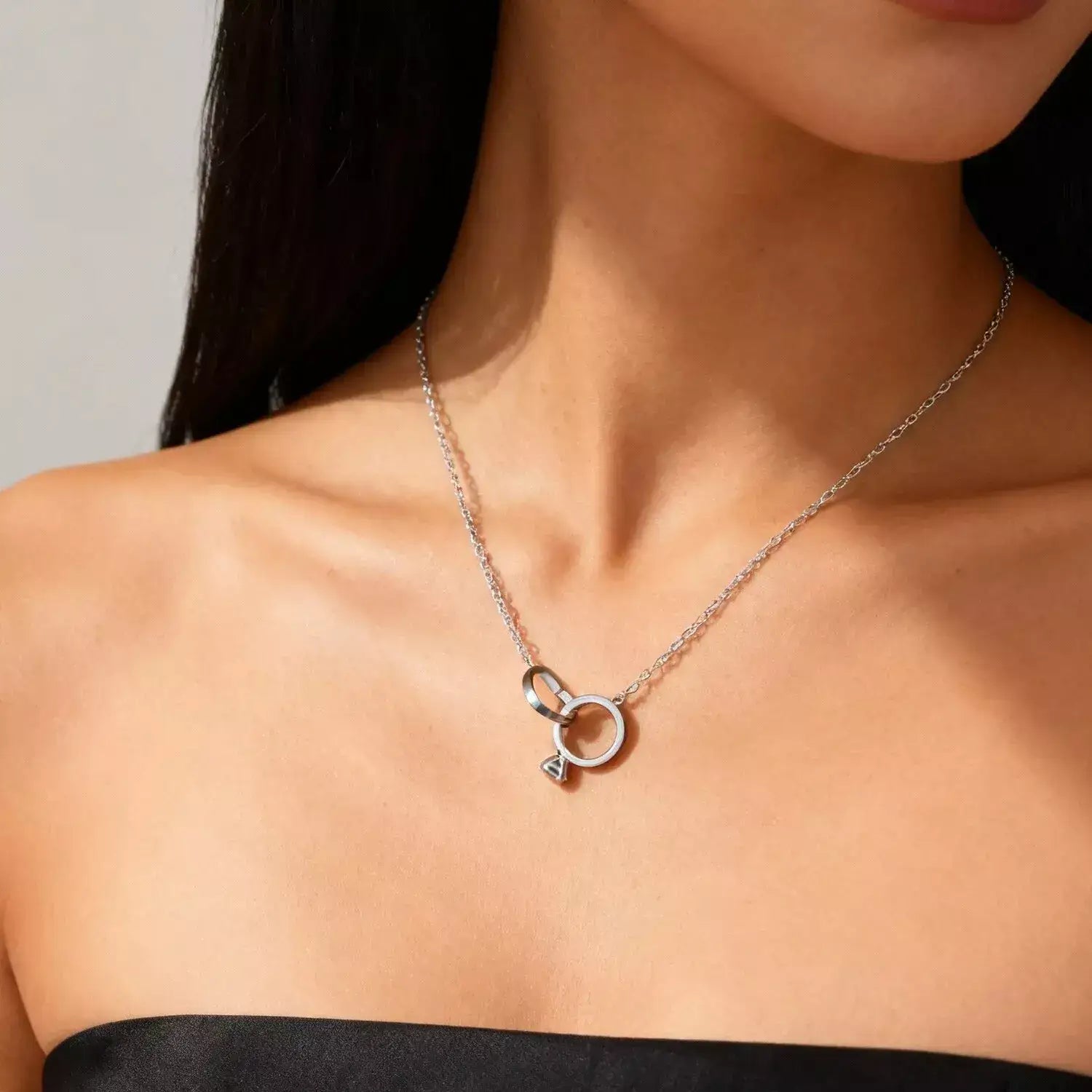 eternal knot necklace, romantic necklace, valentine’s day necklace, valentine’s day gift, romantic gift for her, love necklace, heart and ring necklace, forever love necklace, stainless steel necklace, couples necklace, promise necklace, symbolic jewelry, meaningful necklace, anniversary gift, gift for girlfriend, gift for wife, unisex necklace