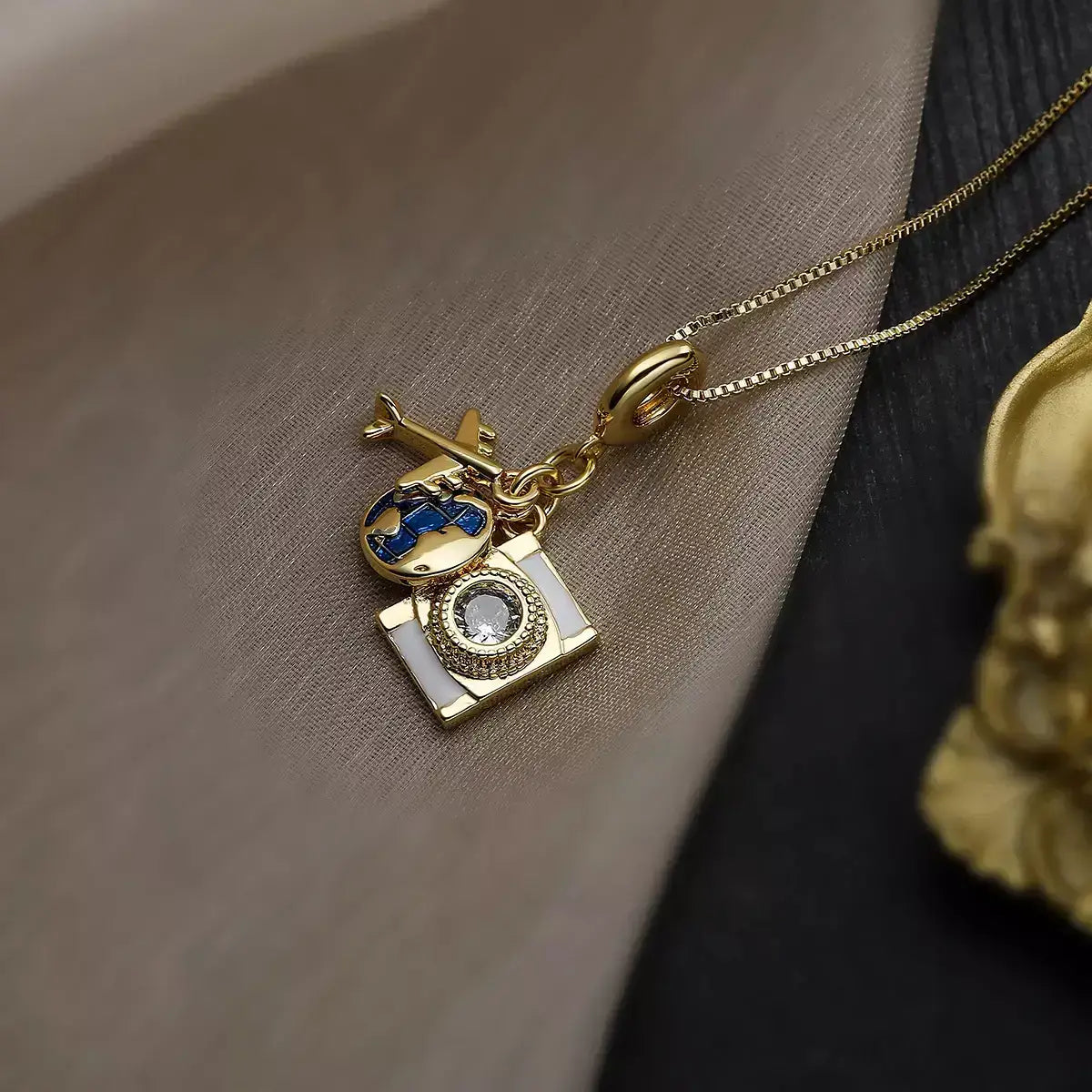 women’s necklace, travel necklace, adventure necklace, map and airplane necklace, elegant jewellery, sophisticated accessory, modern necklace, gift for her, explorer necklace, copper necklace, meaningful necklace, gift for traveller