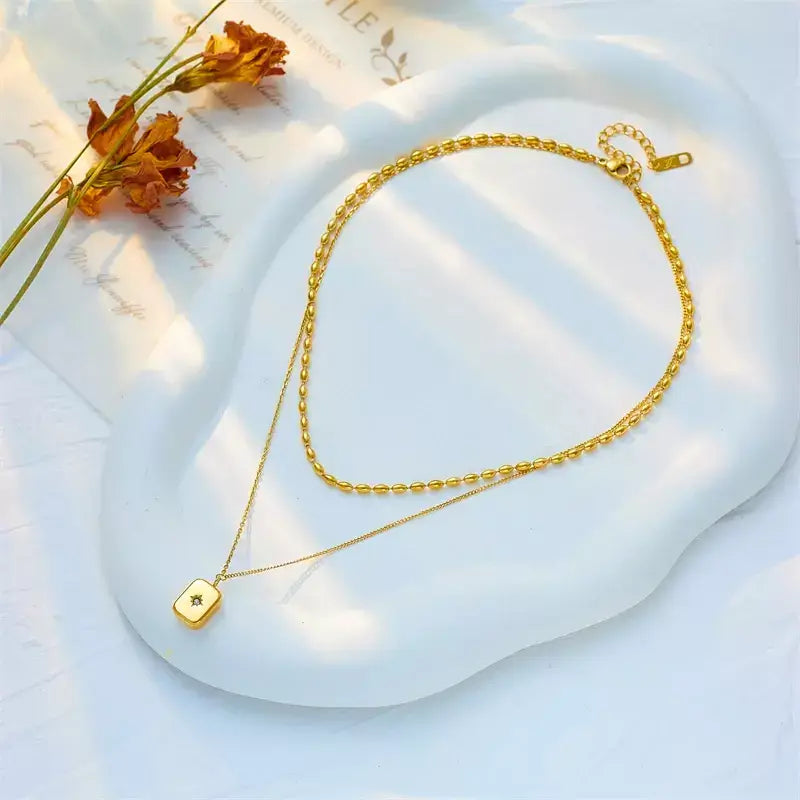 women's gold necklace, stainless steel necklace, pendant necklace for women, trendy women's jewellery, durable necklace, water-resistant necklace, elegant gold necklace, daily wear necklace, fashion necklace for women, gift for her