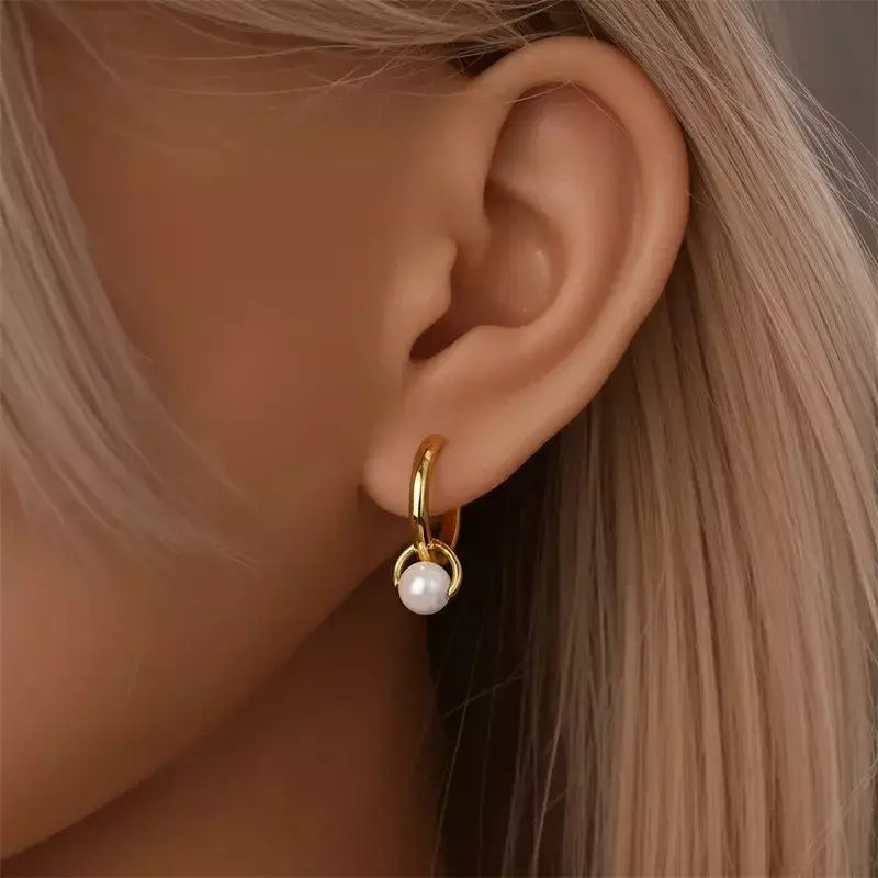 sterling silver hoop earrings, pearl hoop earrings, silver pearl earrings, geometric hoop earrings, gold and pearl earrings, sterling silver earrings for women, sterling silver pearl hoop earrings, pearl hoop earrings for women, hypoallergenic silver earrings, luxury pearl earrings, geometric pearl earrings