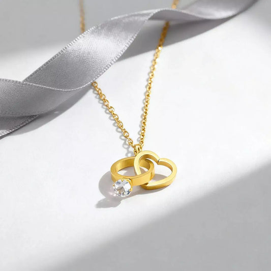 eternal knot necklace, romantic necklace, valentine’s day necklace, valentine’s day gift, romantic gift for her, love necklace, heart and ring necklace, forever love necklace, stainless steel necklace, couples necklace, promise necklace, symbolic jewelry, meaningful necklace, anniversary gift, gift for girlfriend, gift for wife, unisex necklace