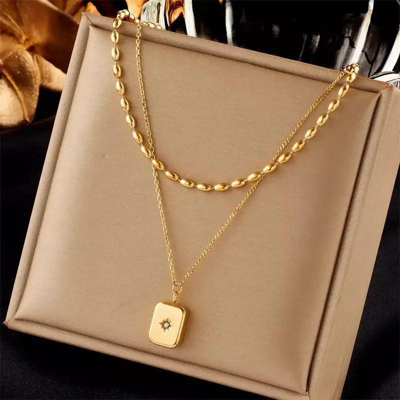 women's gold necklace, stainless steel necklace, pendant necklace for women, trendy women's jewellery, durable necklace, water-resistant necklace, elegant gold necklace, daily wear necklace, fashion necklace for women, gift for her