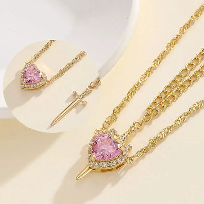 Snow White couple necklace, Huntsman heart and sword necklace, Matching couple necklaces, Romantic Valentine's Day jewellery, Heart and sword pendant, Couple pendant necklace set, Love necklace for couples, Fairytale couple jewellery, His and hers matching necklaces, Snow White inspired necklace