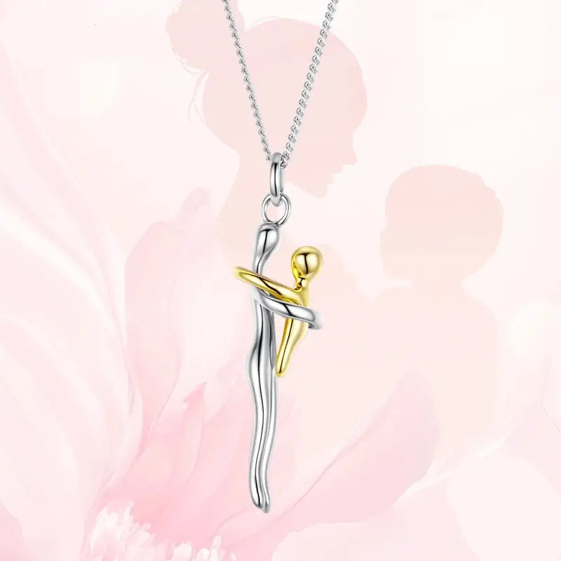 Mother & Child Hug Necklace + kostenlose Geschenkbox mit 6 Rosen,
Zweifarbiges Silber- und Gold-Collier,
Sterling Silber Anhänger „Umarmung“,
Sentimentaler Schmuck für Mama,
Muttertagsgeschenk-Collier,
Mutter & Kind Halskette,
Schmuck für Mutter und Kind,
Bedeutungsvoller Schmuck für Mama,
Andenken-Collier für Mama,
Familienband-Halskette