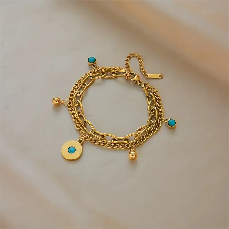 gold stainless steel bracelet,
women’s gold bracelet,
turquoise bead bracelet,
sunburst charm bracelet,
double layer bracelet,
316L stainless steel jewellery,
women’s layered bracelet,
boho chic bracelet,
turquoise jewellery for women,
gold bracelet gift for her,
elegant women’s bracelet,
everyday gold bracelet,
women’s beach jewelry,
minimalist gold bracelet,
durable stainless steel bracelet,
fashion bracelet for women,
turquoise charm bracelet,
gold layered chain bracelet,
sun charm bracelet